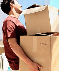 man lifting without ergonomically correct form, straining his back