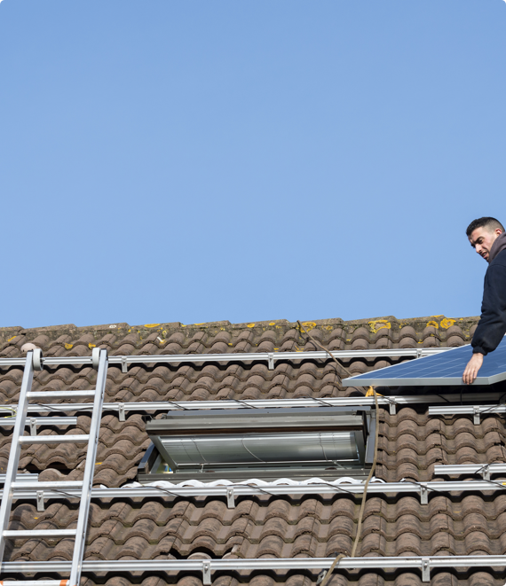 Ladder Safety – french img 2 A man standing on the roof of a home