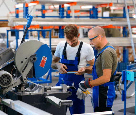 ergonomic assessments img 2 Two workers safely use a circular saw