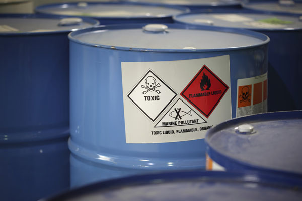 whmis barrels of hazardous materials labelled according to WHIMIS