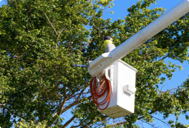 A worker makes use of a power elevated working platform