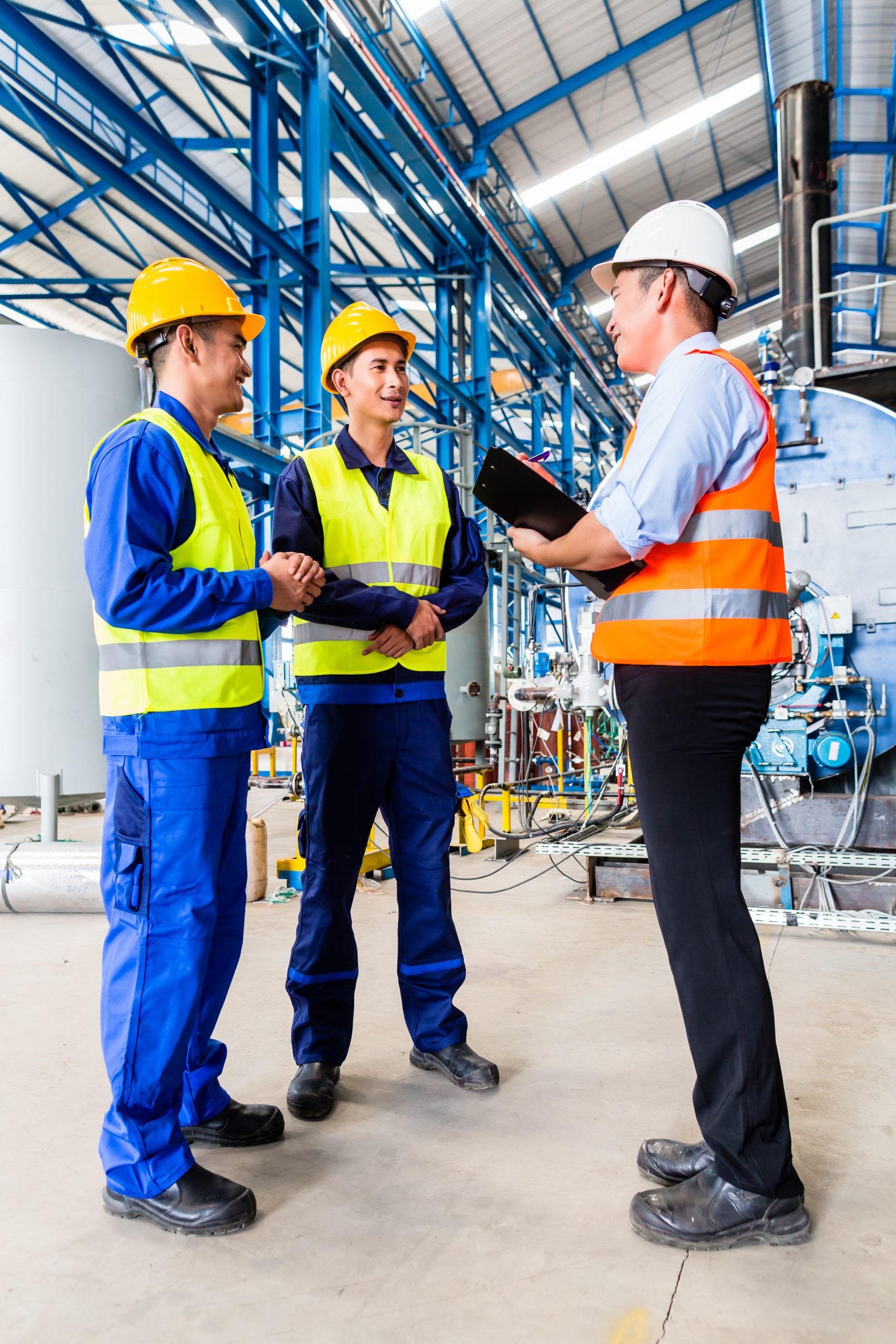 Asian,Factory,Worker,And,Engineer,As,Team,Inspecting,A,Machine JHSC members doing an inspection.